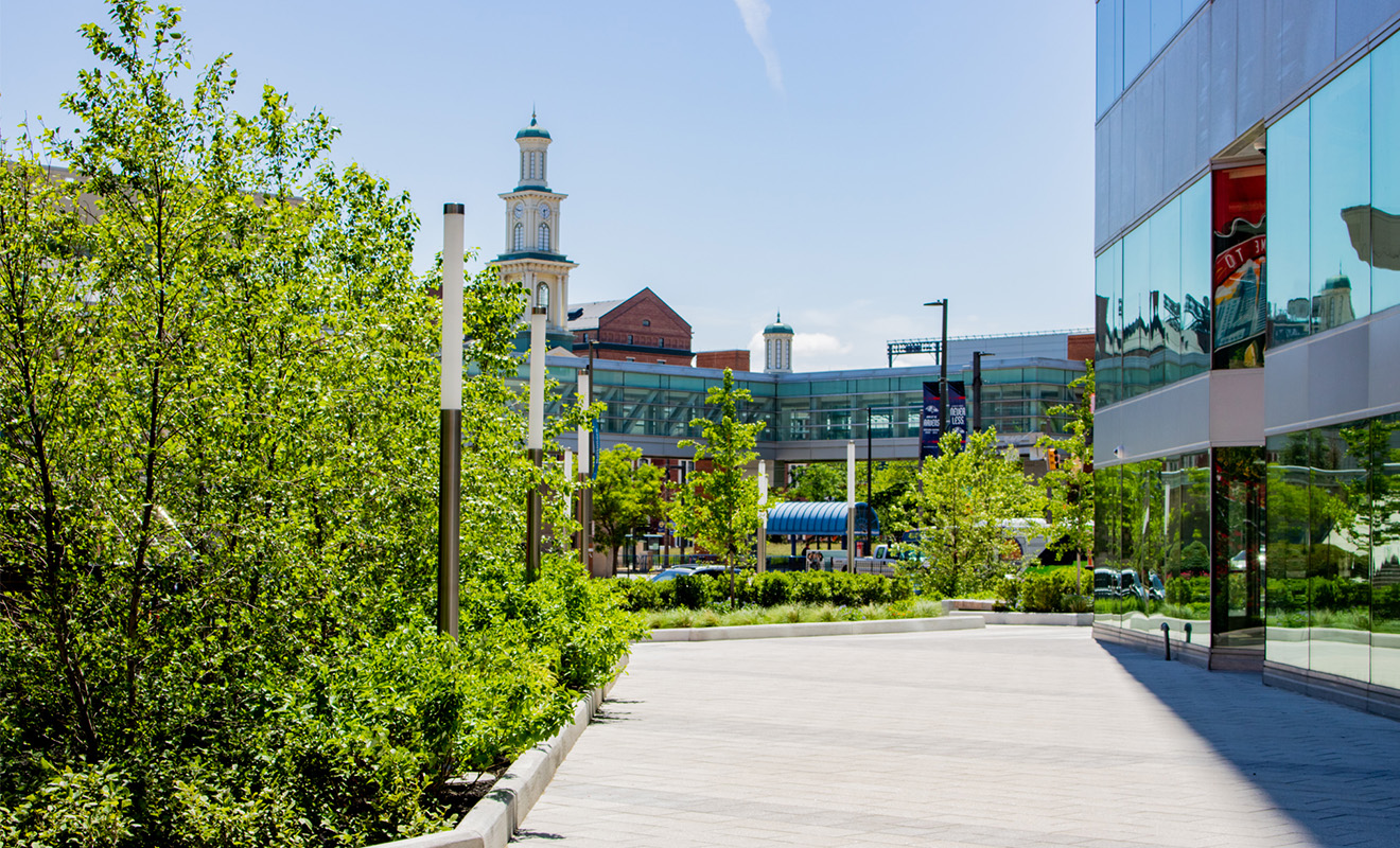 Day time between Pratt Street Ale House and 250 W Pratt facing historic train station