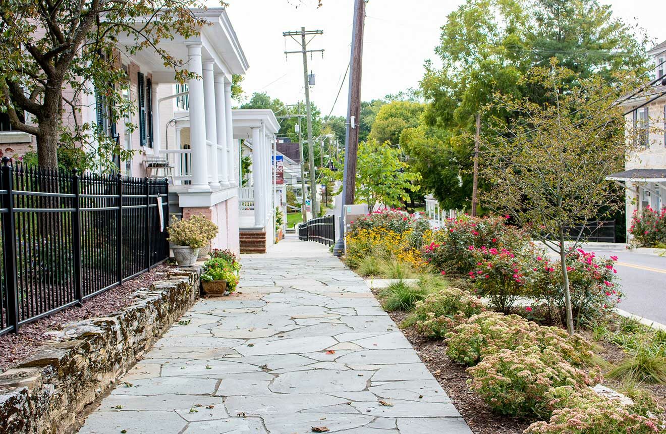 Stone hardscape path replicates the historic materials